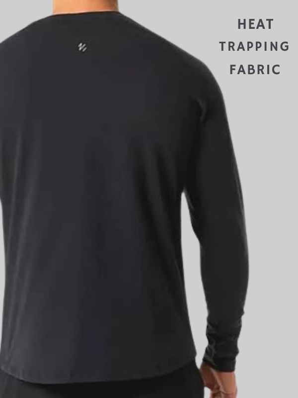 Back view of man wearing black long sleeve sauna shirt made from heat-trapping fabric for sweat enhancement and weight loss support.