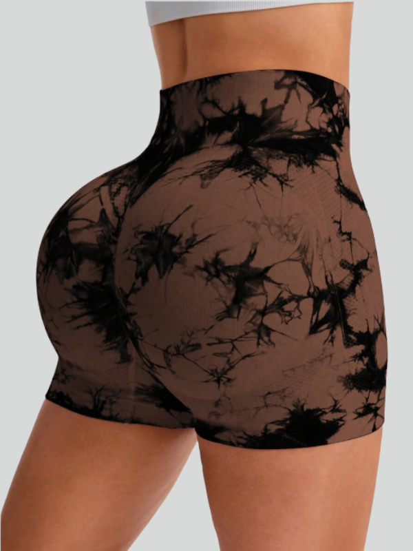 Back view of seamless tie-dye fitness shorts for women, paired with white sports bra