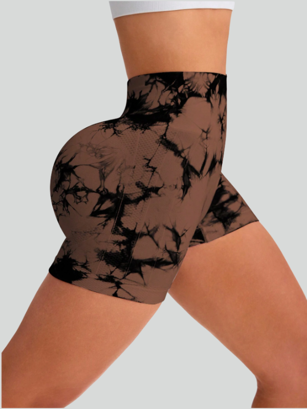 Model in booty-lifting tie-dye yoga shorts showcasing stretch and fit