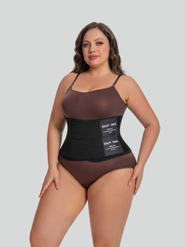 Front view of model wearing black mesh breathable waist trainer with three-band compression design.