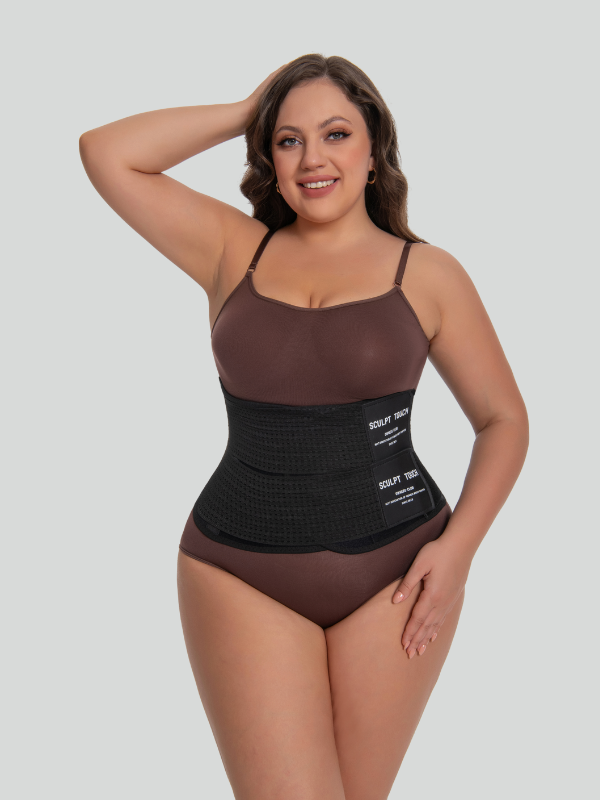 Close-up front shot of black waist trainer highlighting soft inner sweat-boosting layer and secure fit.