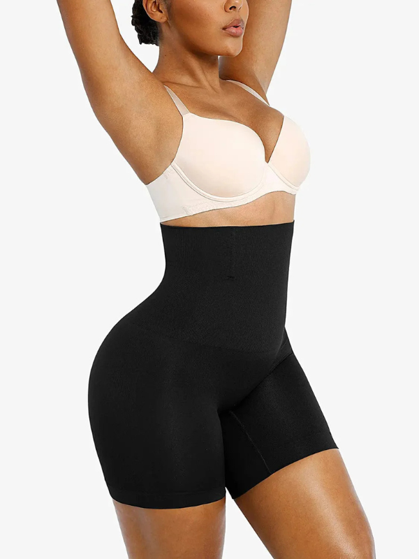 Side view of model showing butt-lifting design and firm support of sculpting shorts.