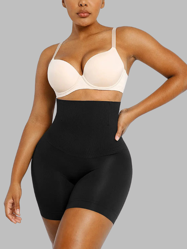 Front view of model wearing high waist sculpting shorts with tummy control and seamless fit.