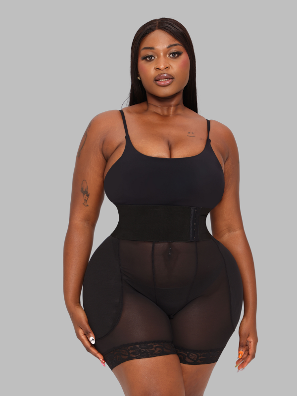 Front view of model wearing black sheer sculpt leggings with built-in waist cincher and hip padding for curve shaping.