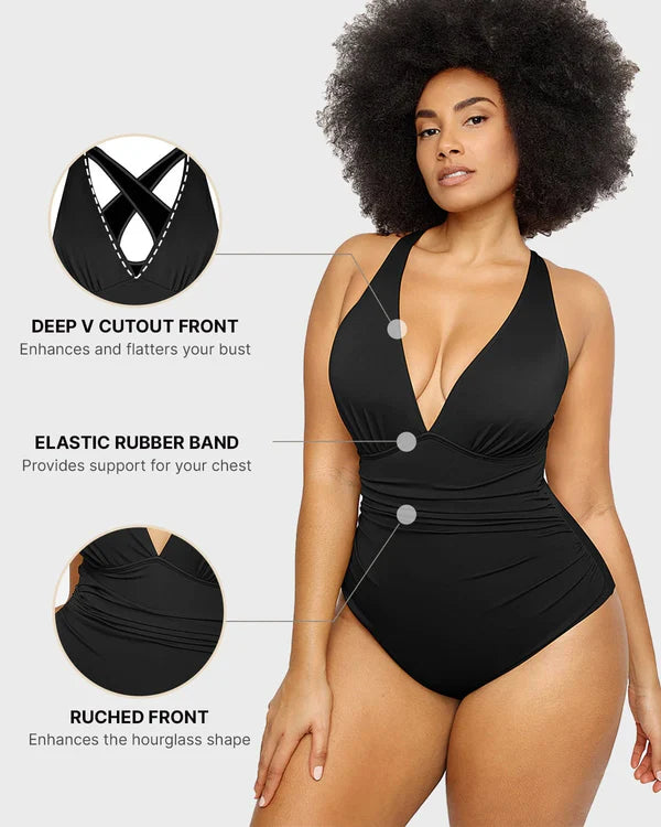 Model wearing Smart Sculpt plunge cutout swimsuit with deep V neckline, ruched front, and chest support band, highlighting shaping features.