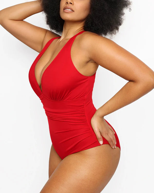 Chic red Smart Sculpt swimsuit with slimming ruched waist and bust-enhancing neckline