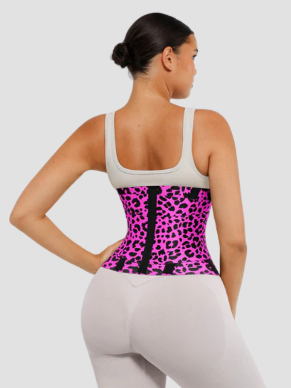 Back view of woman wearing SCULPT TOUCH pink leopard print waist trainer showing contoured fit and triple-strap design for waist shaping.